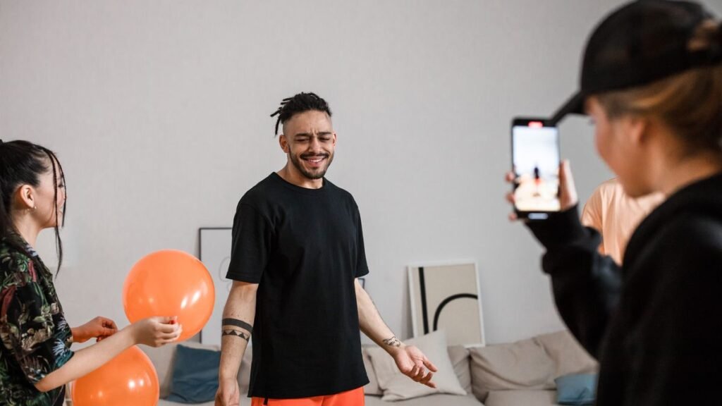 Friends filming a short vertical video with a smartphone
